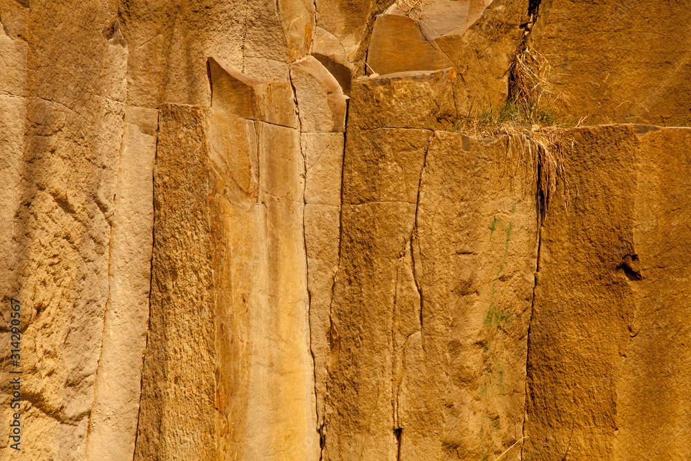 Fototapeta premium Image of ancient prehistoric stone wall texture background. Horizontal image.