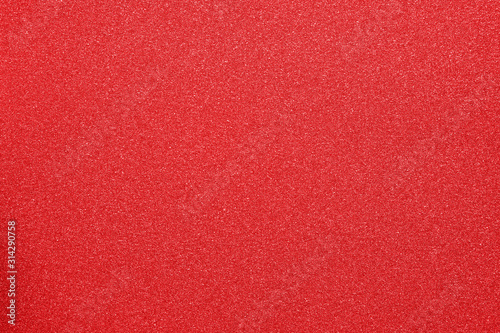 red glitter textured background with copy space