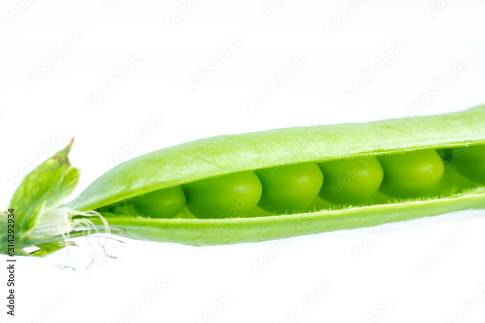 Opened green pea pod with peas is concept macro of organic food Opened green pea pod with peas is concept macro of organic food
