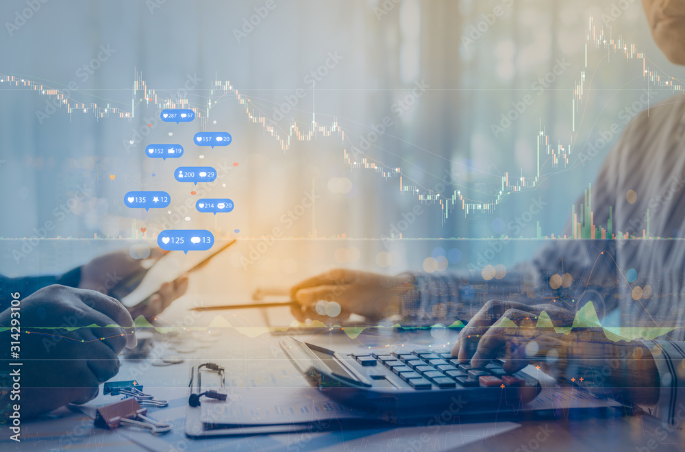 Double exposure of two businessman using a social media marketing concept on mobile phone with notification icons with Investors are calculating on calculator investment costs. Double exposure of two businessman using a social media marketing concept on mobile phone with notification icons with Investors are calculating on calculator investment costs.