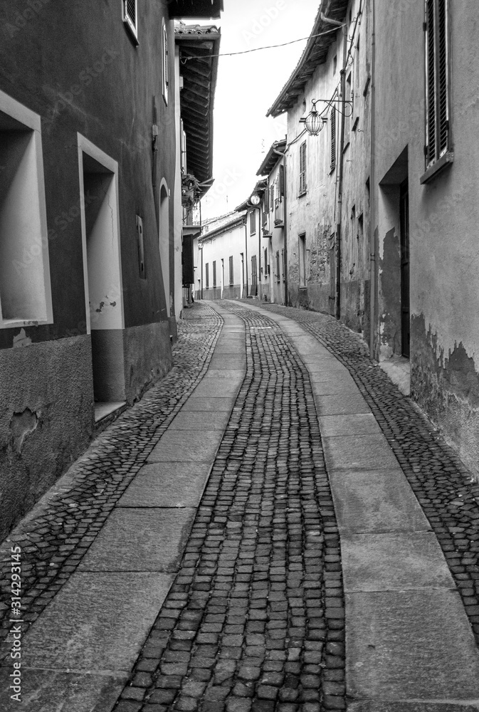 Old street in the village of Neive, in the hilly region of the Langhe (Piedmont, Northern Italy) UNESCO site since 2014; this area is world famous for its valuable red wines, like Barolo.