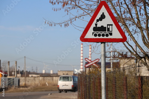 Obraz na plátně Railway level crossing ahead warning signs