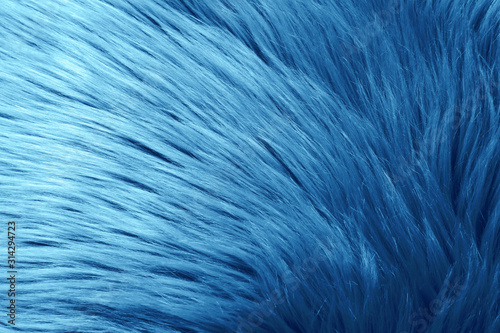 Faux fur as background. Color of the year 2020 (Classic blue)