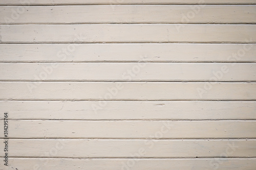 Old, white abstract house exterior wall from wood.