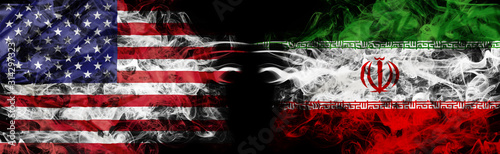 American flag and Iranian flag in smoke shape on black background. Concept of world conflict and war. America VS Iran metaphor. Winds of war.