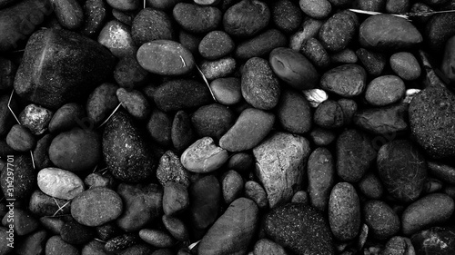 Naklejka black stone background, pebble beach stone floor