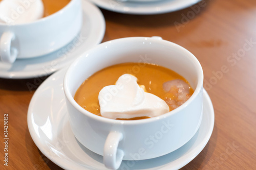  pumpkin soup in white cup