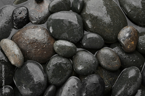 Photography Spa stones in water as background, top view. Zen lifestyle