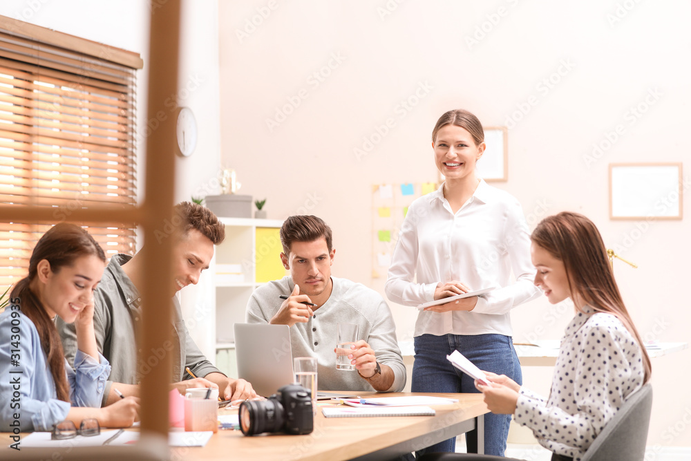 Team of professional journalists working in office Team of professional journalists working in office