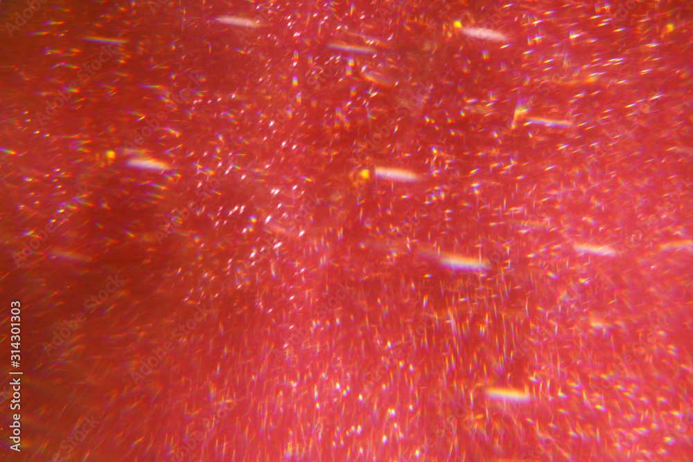 Pink glitter texture abstract background. Defocused bokeh. Pink glitter texture abstract background. Defocused bokeh.