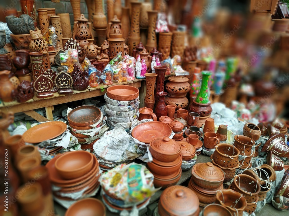Decorative ceramic and wooden vase. Group of decorative ceramic and wooden vase in the market