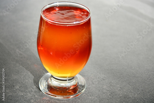 Glass cup with delicious fruit jelly.