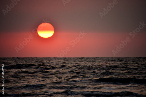 Fototapeta Naklejka Na Ścianę i Meble -  sunset over the Arabian sea