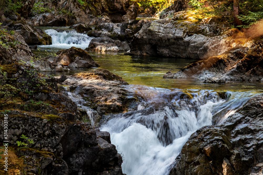 The upper and lower falls , Qualicum Falls, Vancouver Island, BC, Canada The upper and lower falls , Qualicum Falls, Vancouver Island, BC, Canada