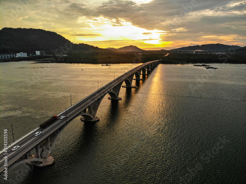 Sunset view over the bridge and river.