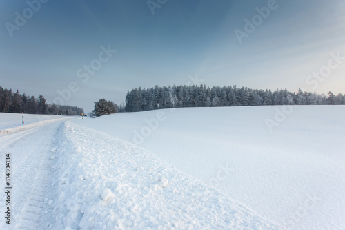 winter landscape with the road in the snow © wolf139