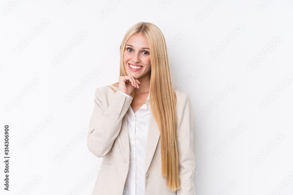 Young business blonde woman on white background smiling happy and confident, touching chin with hand. Young business blonde woman on white background smiling happy and confident, touching chin with hand.