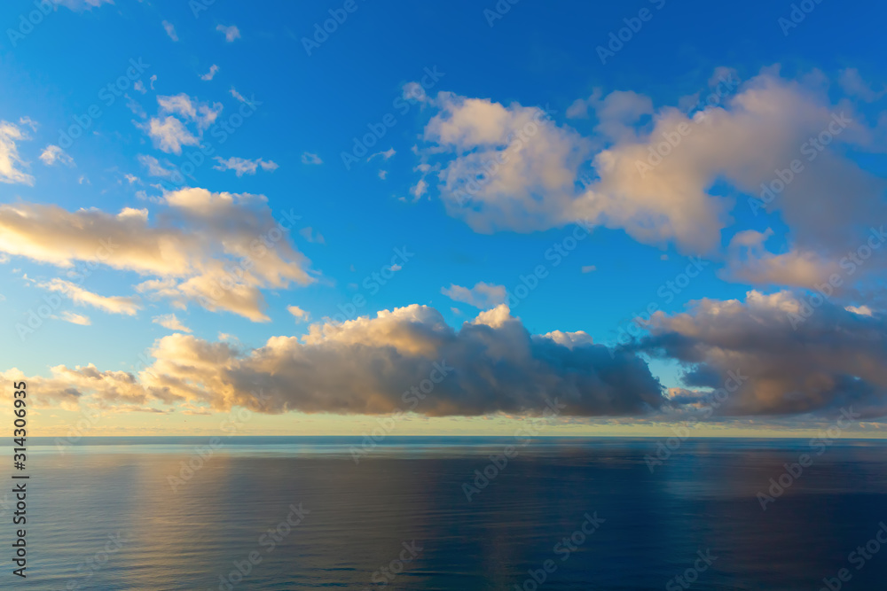 seascape with sky and clouds at sunrise