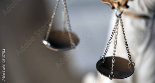 Symbol of law and justice on wooden table in lawyer office © Aerial Mike