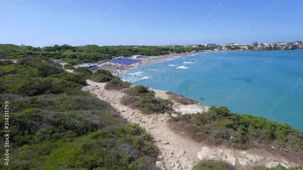 Beach drone fly over cliff, south italy sea, Salento white beach Beach drone fly over cliff, south italy sea, Salento white beach