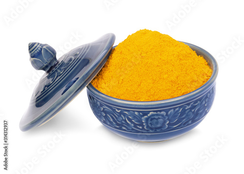 Turmeric is a herbaceous plant. The rhizome of turmeric has an astringent taste, fragrant aroma that is an herb that can be used as a medicine. Put the cup with a separate lid on a white background.