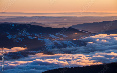 sunrise over the mountains. Ceahlau and Piatra Neamt. Romania