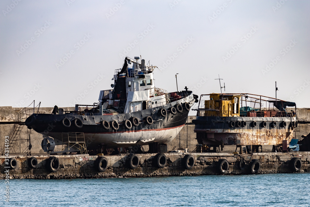 Old ships on the dock in the city of Yalta.