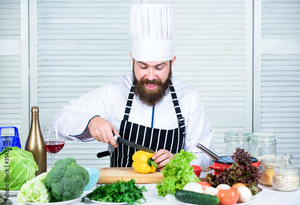 Man master chef or amateur cooking food. Sharp knife chopping vegetable. According to recipe. Prepare ingredient for cooking. Useful for significant amount of cooking methods. Basic cooking processes Man master chef or amateur cooking food. Sharp knife chopping vegetable. According to recipe. Prepare ingredient for cooking. Useful for significant amount of cooking methods. Basic cooking processes