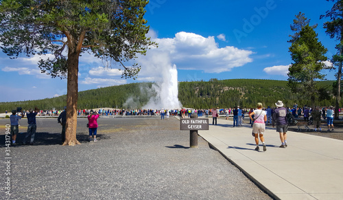 Photography Visitors are treated to a beautiful display of Old Faithful's thermal waters over the Labor Day weekend