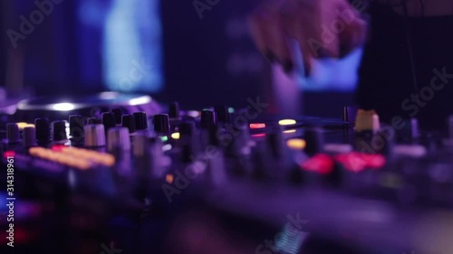 Girl Works As A DJ. Hands Close Up.