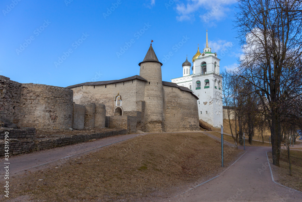 Panorama of the medieval fortress and Holy Trinity Cathedral. There is a Sunny day in early spring. Pskov, Russia.