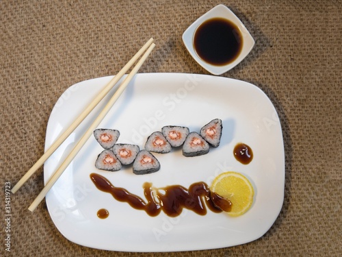 Sushi rolls closeup on burlap background