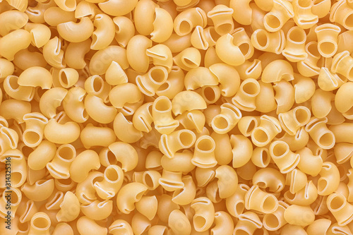 Raw pasta ingredient for traditional italian food as texture background.Copy Space