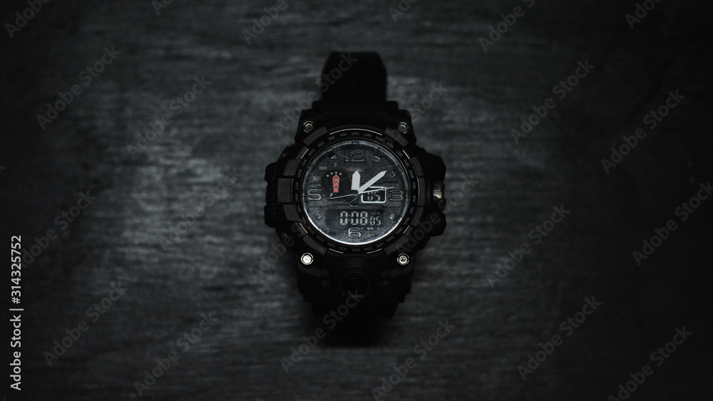 Generic black watch in black background Generic black watch in black background