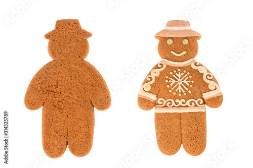 Homemade holiday bakery. Gingerbread man. Figure of smiling man in hat. Festive sweets. Christmas tradition. Isolated on white background. Back and front view