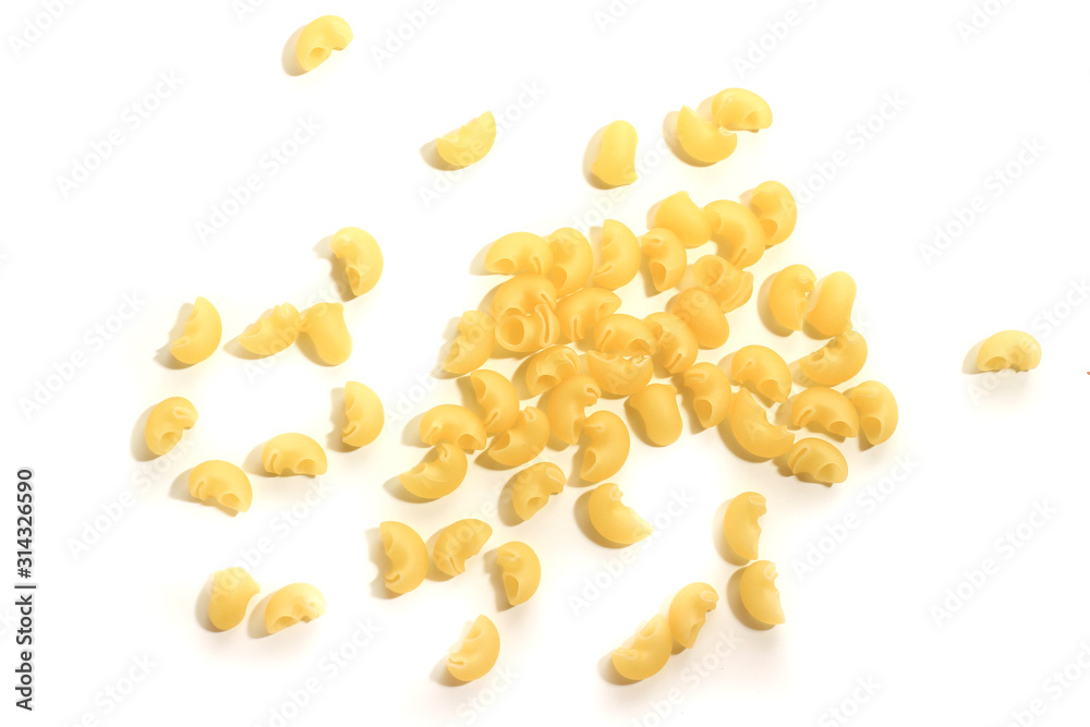 Curved raw pasta on a white isolated background