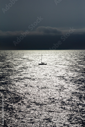 sailboat silhouette in the sea © celso claro