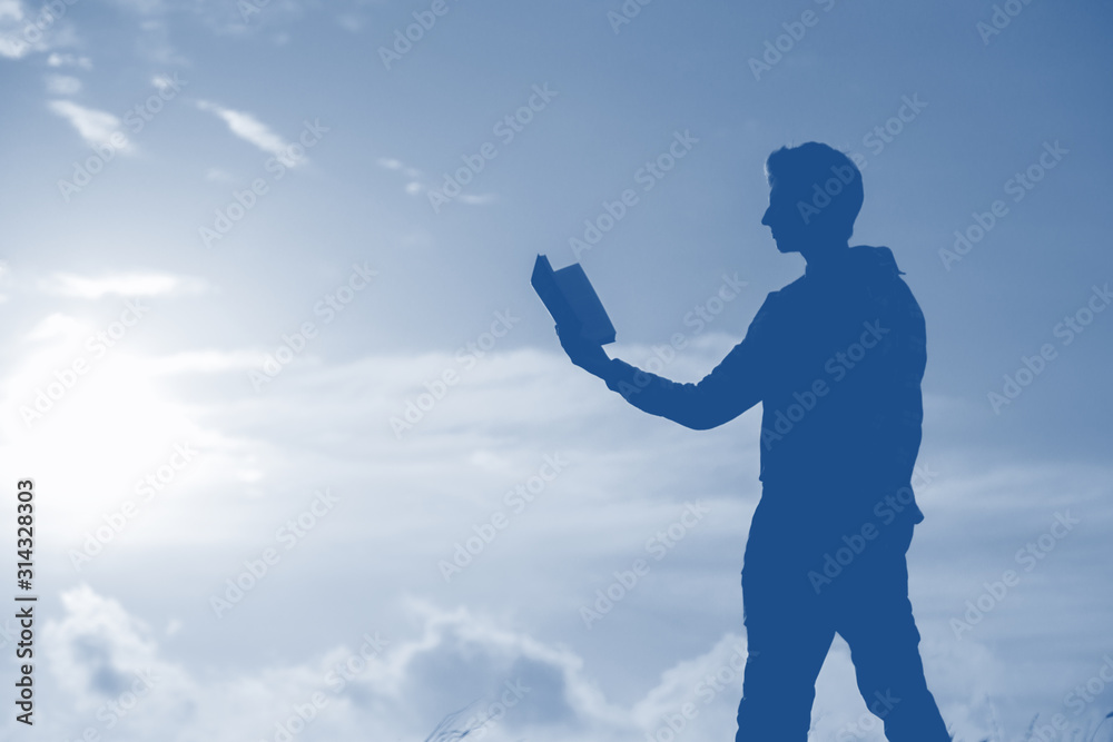 Silhouette of a men against beautiful romantic sunset sky with clouds. Silhouette of a men against beautiful romantic sunset sky with clouds.