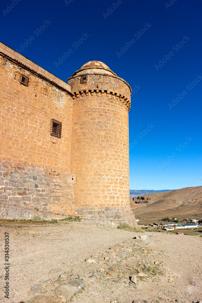 corner tower of medieval spanish castle La Calahorra, Granada, Andalucia, Spain