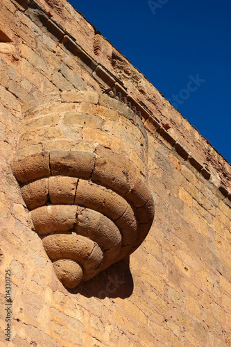 Little balcony on the wall of medieval castle La Calahorra, Andalucia, Spain