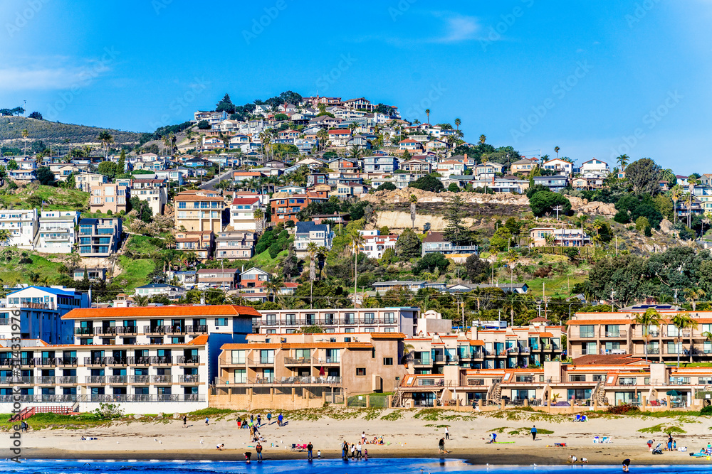 Hillside of houses, homes by Beach 
