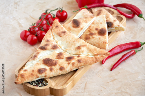 Traditional arabic pie Manakish with spinach and potato photo