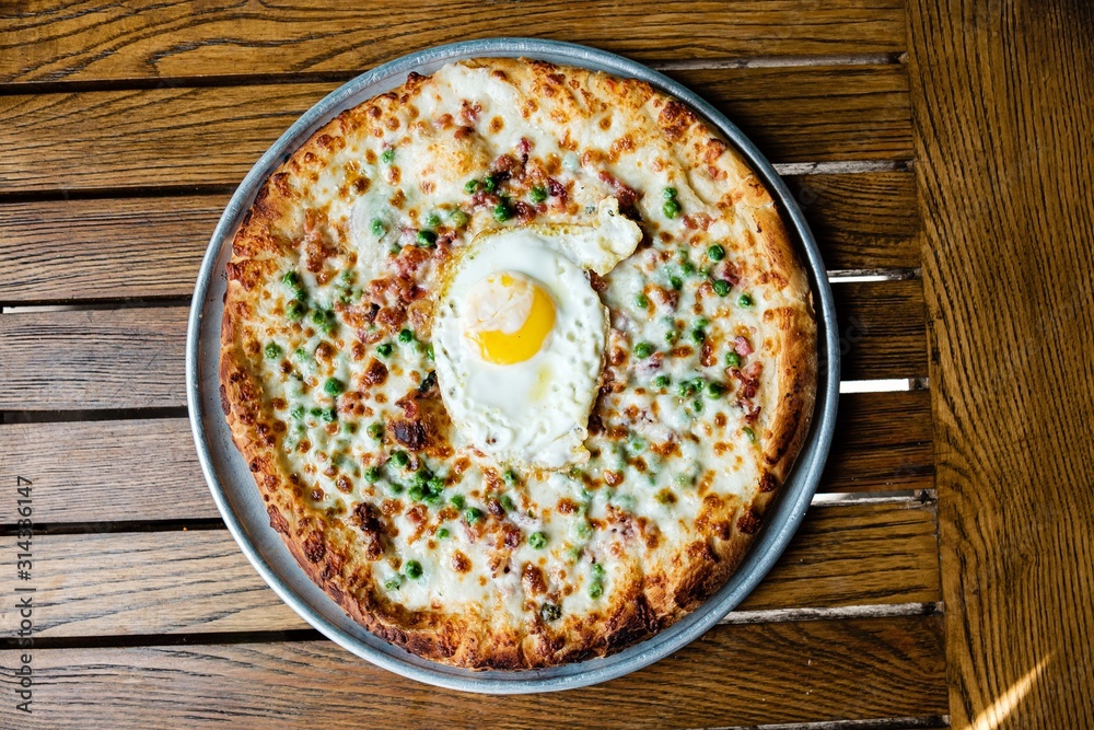 Cheese pizza with an egg Cheese pizza with an egg