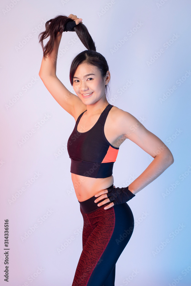 Beautiful asian fitnesses woman in studio Beautiful asian fitnesses woman in studio