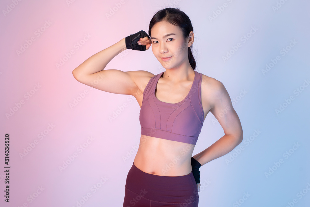 Beautiful asian fitnesses woman in studio Beautiful asian fitnesses woman in studio