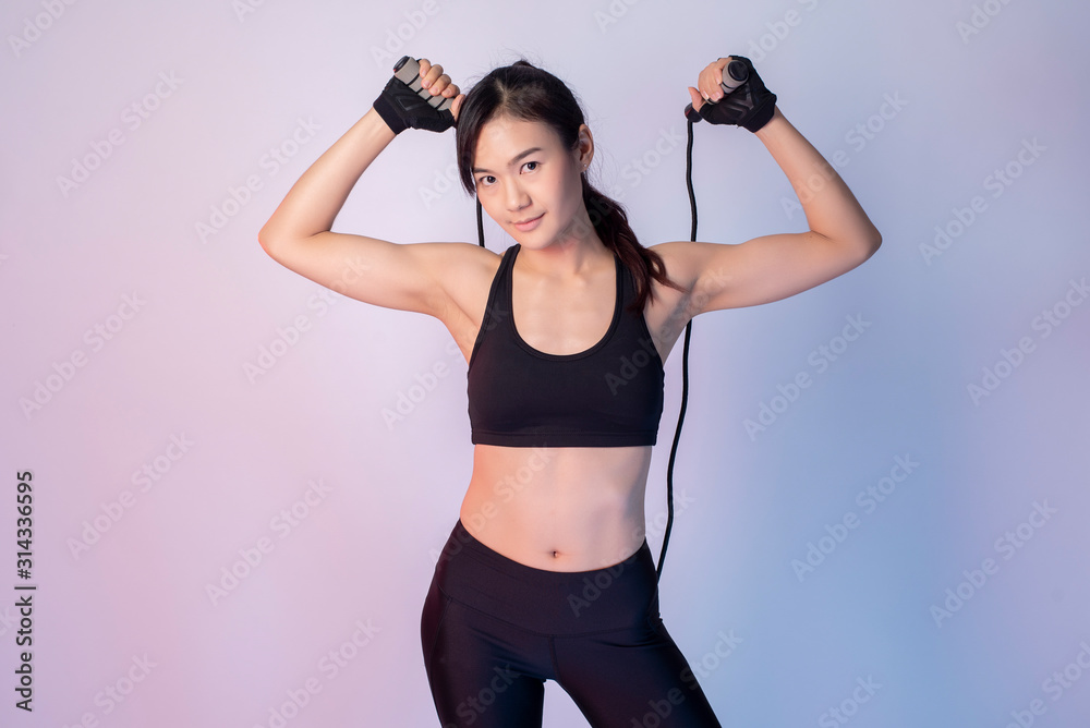 Beautiful asian fitnesses woman in studio Beautiful asian fitnesses woman in studio