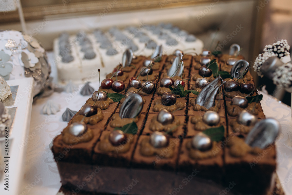 Delicious decorated chocolate cake on the table Delicious decorated chocolate cake on the table