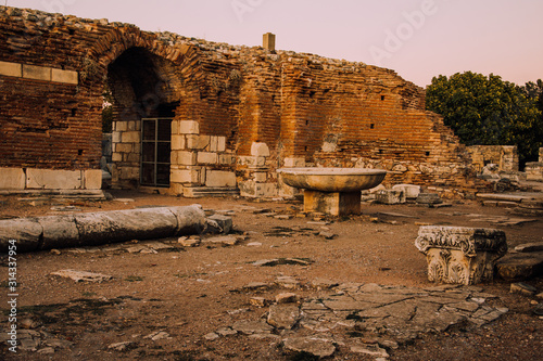 Antique city.Church of the Virgin in Ephesus.Ruins of an ancient city in Turkey. Archaeological site, expedition.Remains of an ancient Greek city in the mountains. Byzantine architecture.Stone walls photo