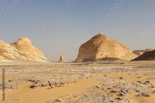 Natural rock formation in the white desert in the west of Egypt in daytime
