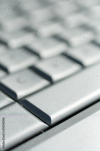 Close up shot of a laptop keyboard with the space key in focus